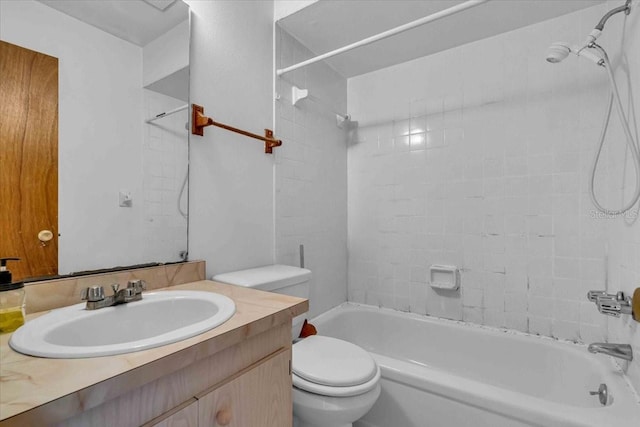 bathroom with shower / bathing tub combination, vanity, and toilet