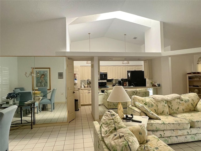 living room featuring light tile patterned floors and high vaulted ceiling