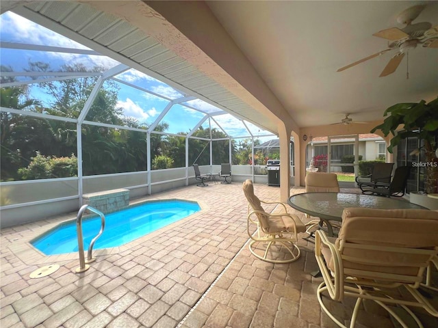 outdoor pool featuring a patio area, outdoor dining space, area for grilling, a lanai, and ceiling fan