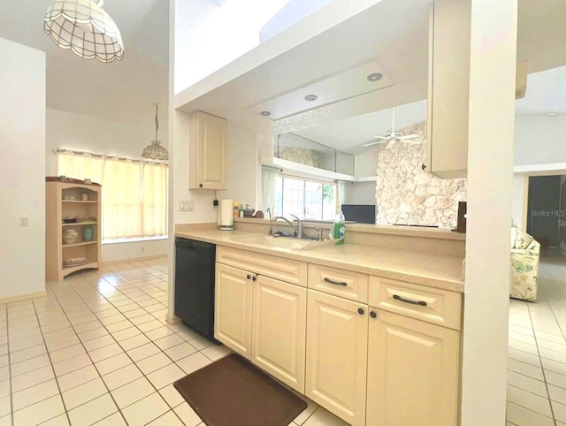 kitchen with light countertops, a sink, light tile patterned flooring, a ceiling fan, and dishwasher