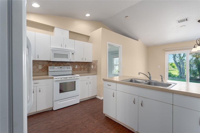 kitchen featuring white appliances, a sink, visible vents, white cabinetry, and light countertops