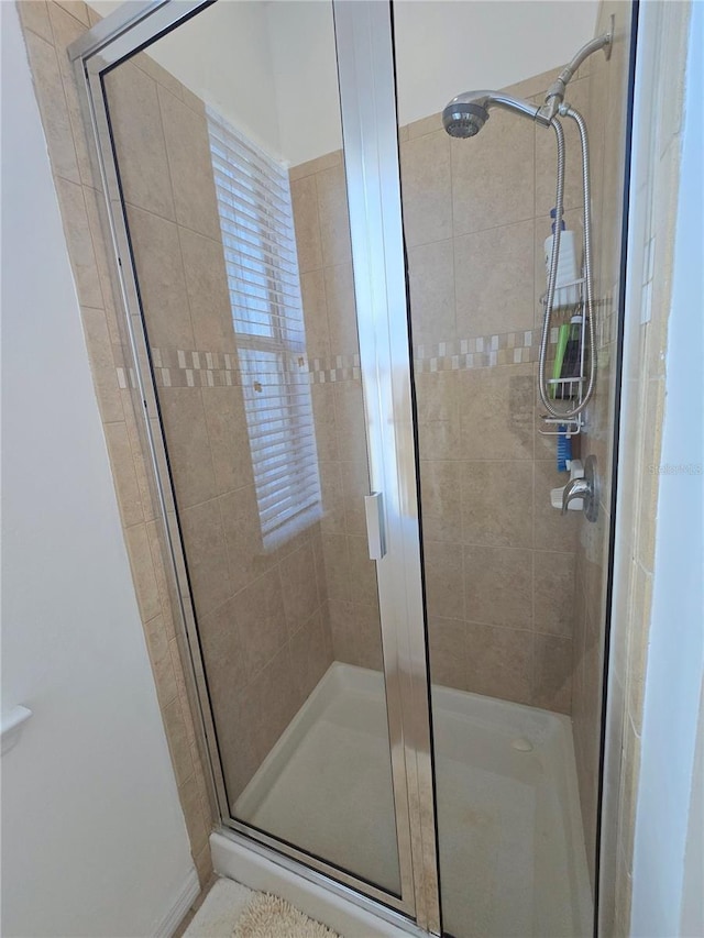 bathroom featuring a stall shower