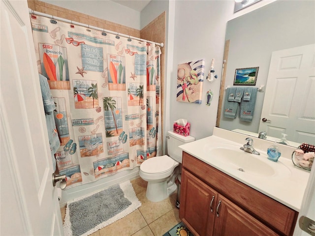 bathroom with toilet, vanity, shower / tub combo with curtain, and tile patterned floors