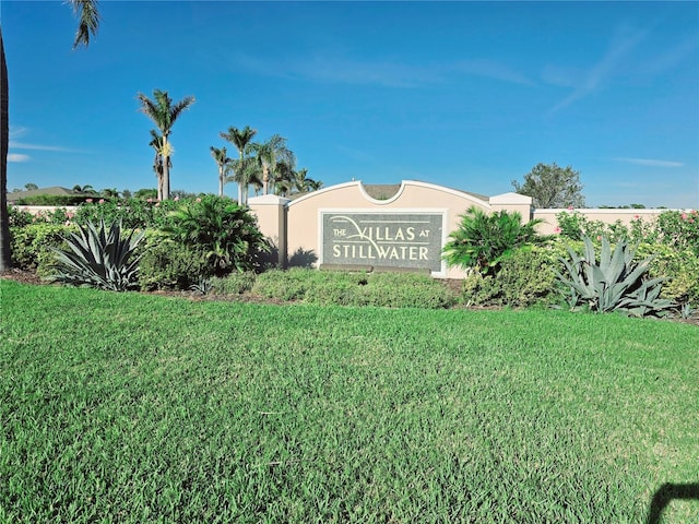 community sign with a yard