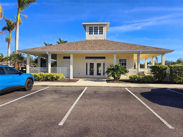 view of property with uncovered parking