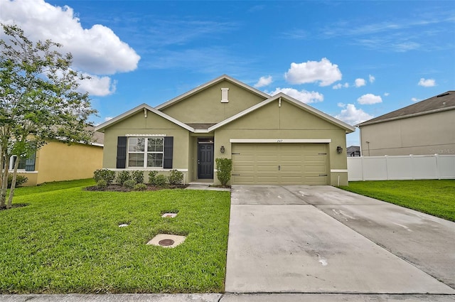 ranch-style home featuring a front lawn and a garage