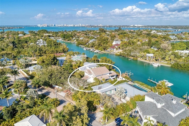 drone / aerial view with a water view