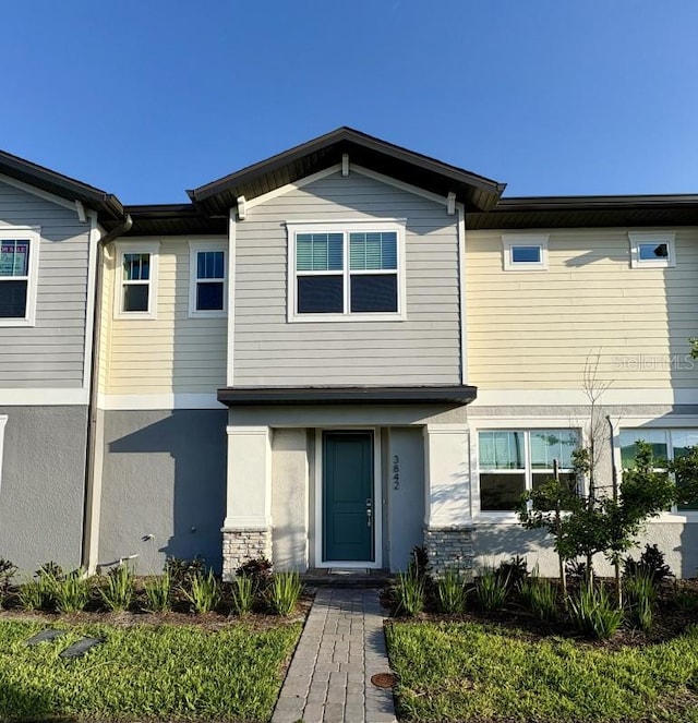 multi unit property featuring stucco siding