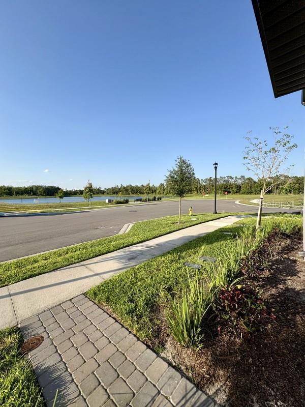 view of yard featuring a water view