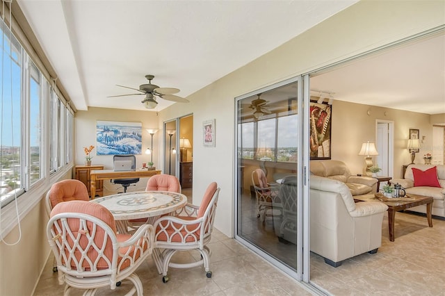 sunroom / solarium with ceiling fan