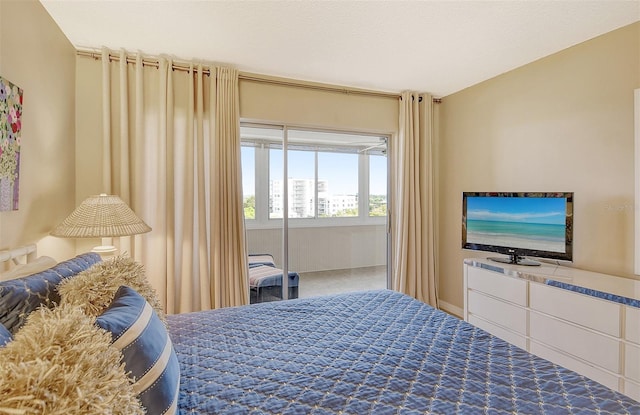 bedroom featuring carpet floors and a textured ceiling