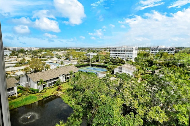 bird's eye view with a water view