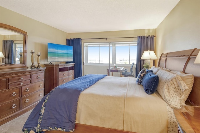 bedroom featuring a textured ceiling