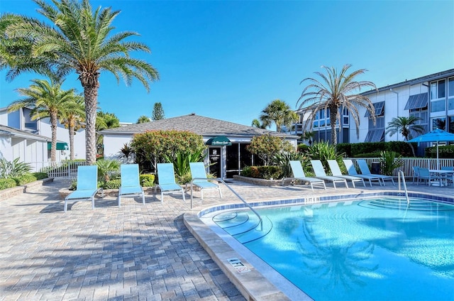 view of swimming pool featuring a patio