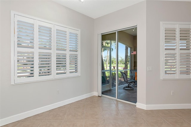 view of tiled spare room