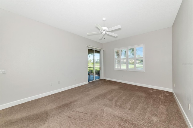 carpeted empty room with ceiling fan