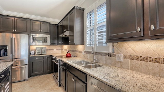 kitchen featuring sink, ornamental molding, appliances with stainless steel finishes, and decorative backsplash