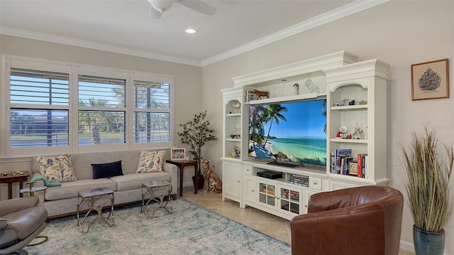 living room with crown molding, ceiling fan, and light tile patterned floors