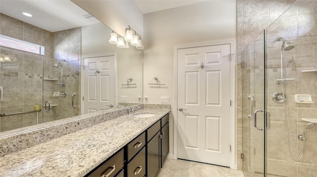 bathroom featuring vanity and walk in shower