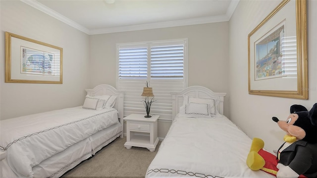 carpeted bedroom with ornamental molding