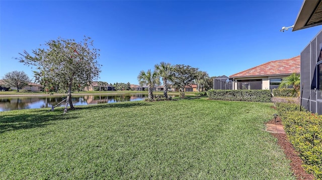 view of yard with a water view