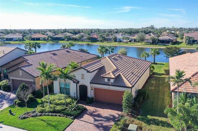 drone / aerial view featuring a water view