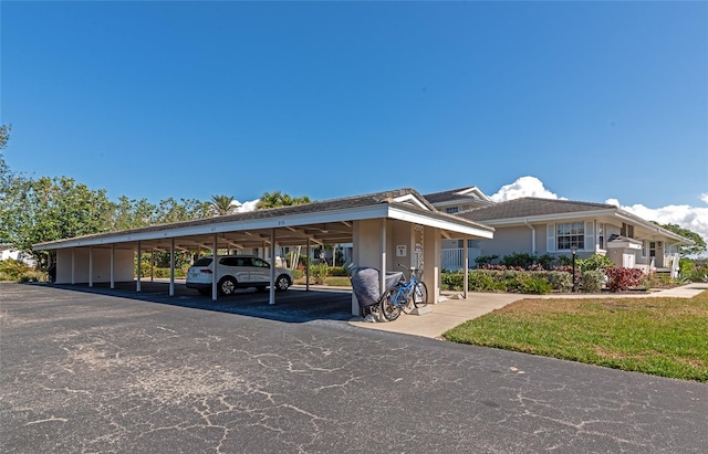 view of front of home with a carport