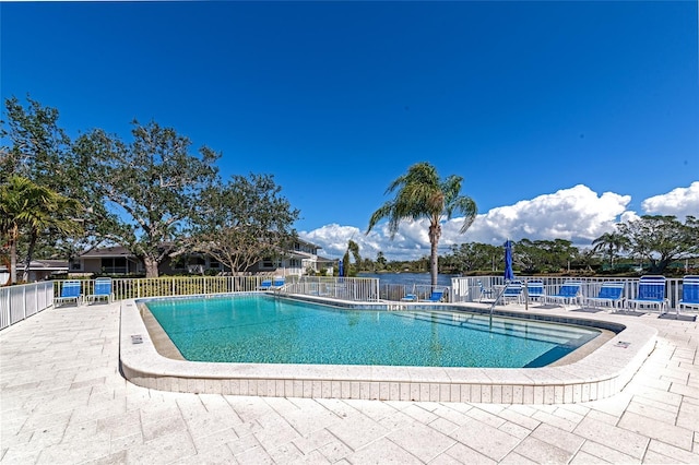 view of pool featuring a patio