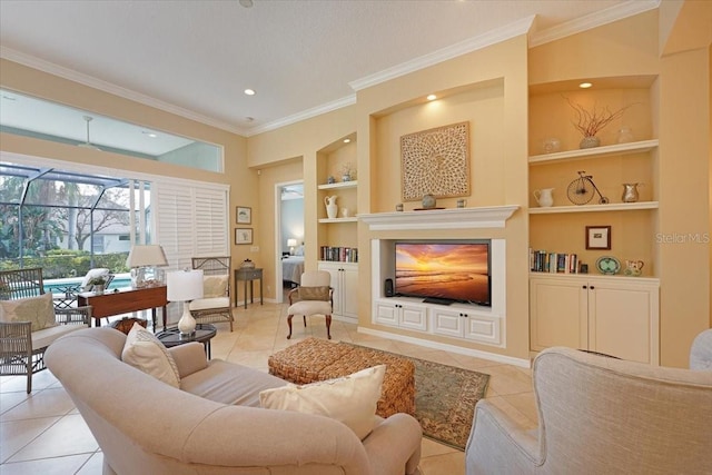 living room featuring light tile patterned floors, crown molding, a fireplace, and built in features