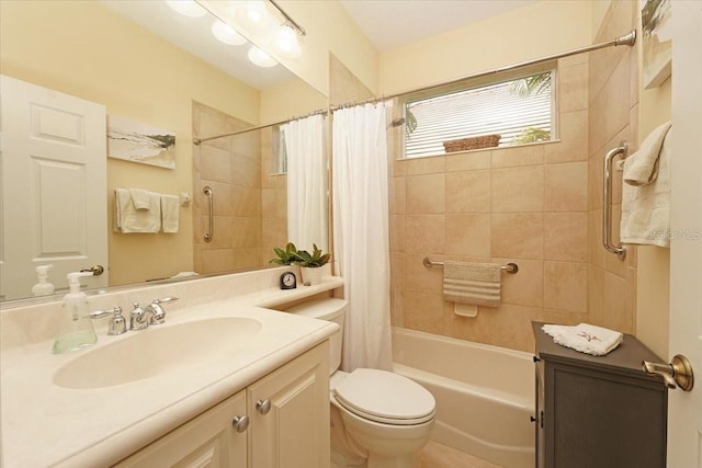 full bathroom featuring shower / bath combination with curtain, vanity, and toilet