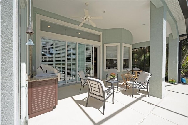 view of patio featuring a ceiling fan