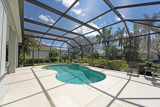 pool with a lanai and a patio area