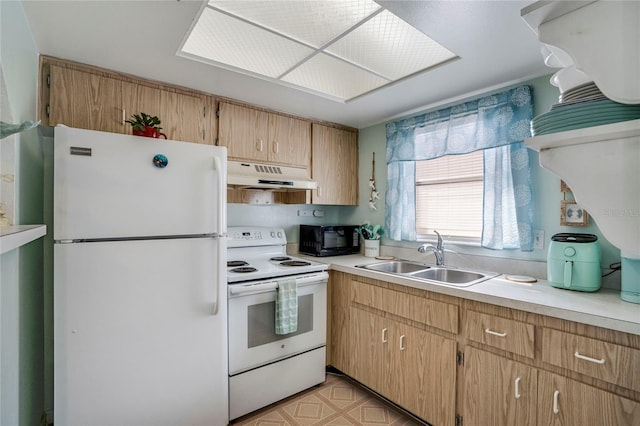 kitchen featuring under cabinet range hood, white appliances, a sink, light countertops, and light floors