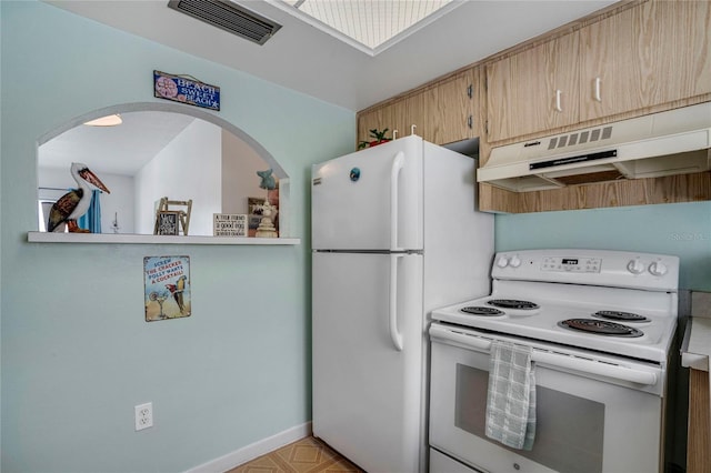 kitchen with light countertops, visible vents, light brown cabinetry, white appliances, and under cabinet range hood