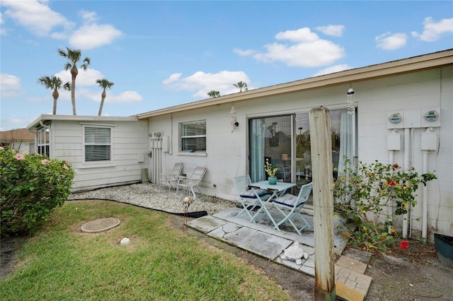 2907 51st Ave W, Bradenton, FL 34205 - back of property featuring a patio area and a lawn