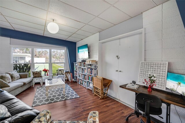2907 51st Ave W, Bradenton, FL 34205 - living area featuring a drop ceiling, wood finished floors, and an office area