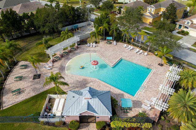 view of swimming pool with a pergola and a patio