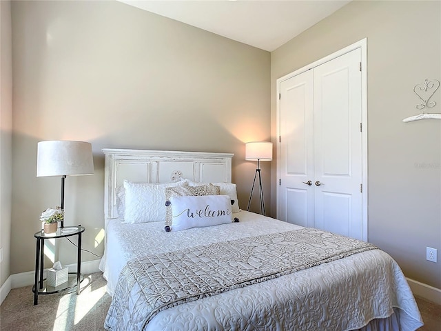 carpeted bedroom with a closet