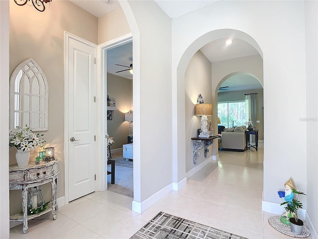 hallway featuring light tile patterned floors