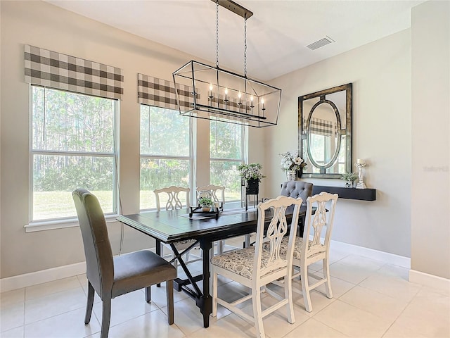 dining room featuring light tile patterned floors