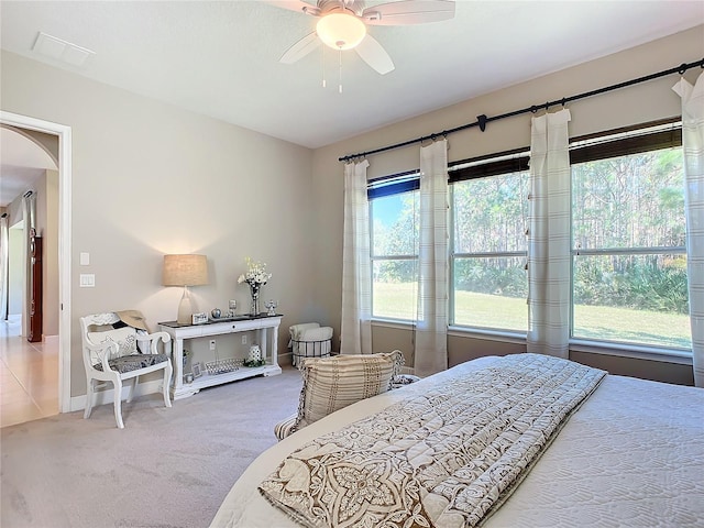 bedroom featuring ceiling fan and carpet flooring