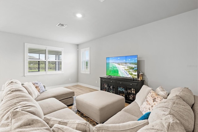 44325 Saddlewood Ct, Punta Gorda, FL 33982 - living area with wood finished floors and recessed lighting