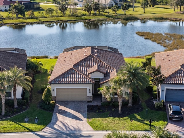 drone / aerial view with a water view