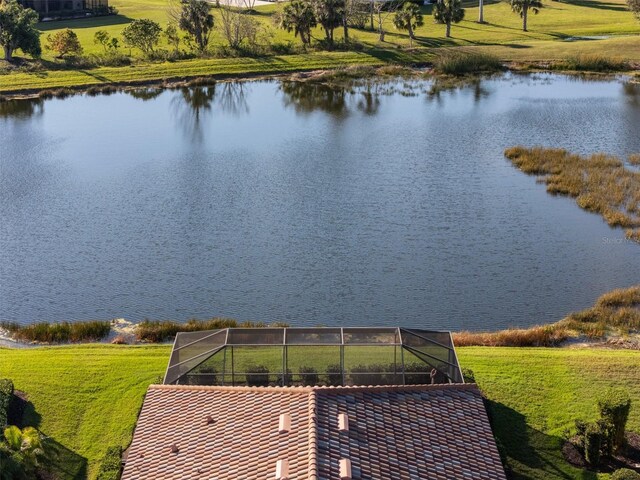 birds eye view of property featuring a water view