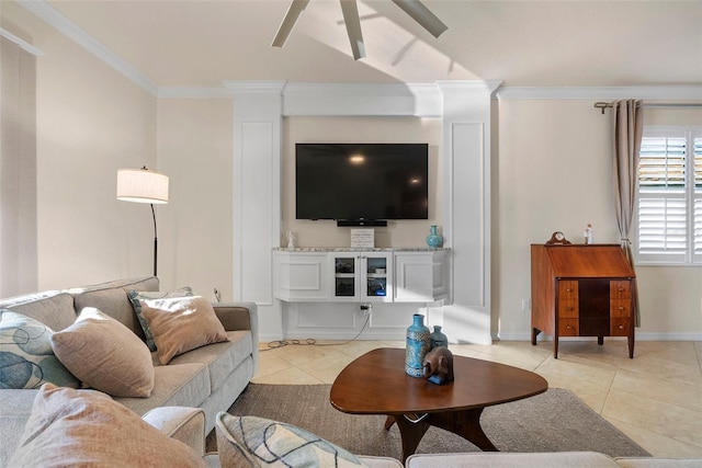 living area featuring ornamental molding, baseboards, and light tile patterned floors