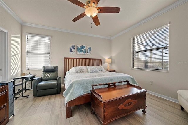 bedroom with ornamental molding, multiple windows, and light wood-style flooring