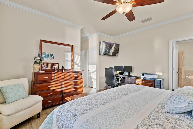 bedroom featuring a ceiling fan, visible vents, crown molding, and wood finished floors