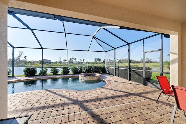 view of swimming pool with a water view, a patio area, a pool with connected hot tub, and glass enclosure