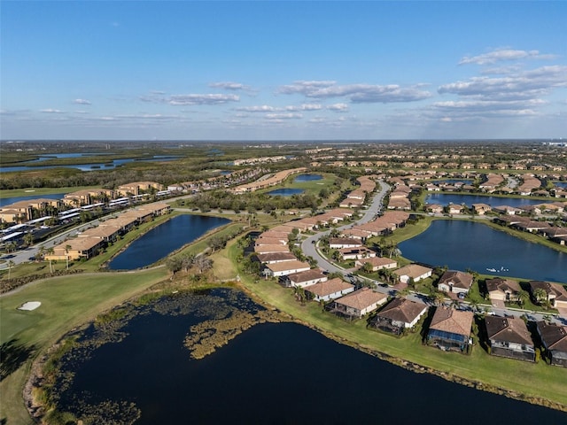 aerial view with a water view and a residential view