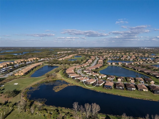 aerial view with a water view and a residential view